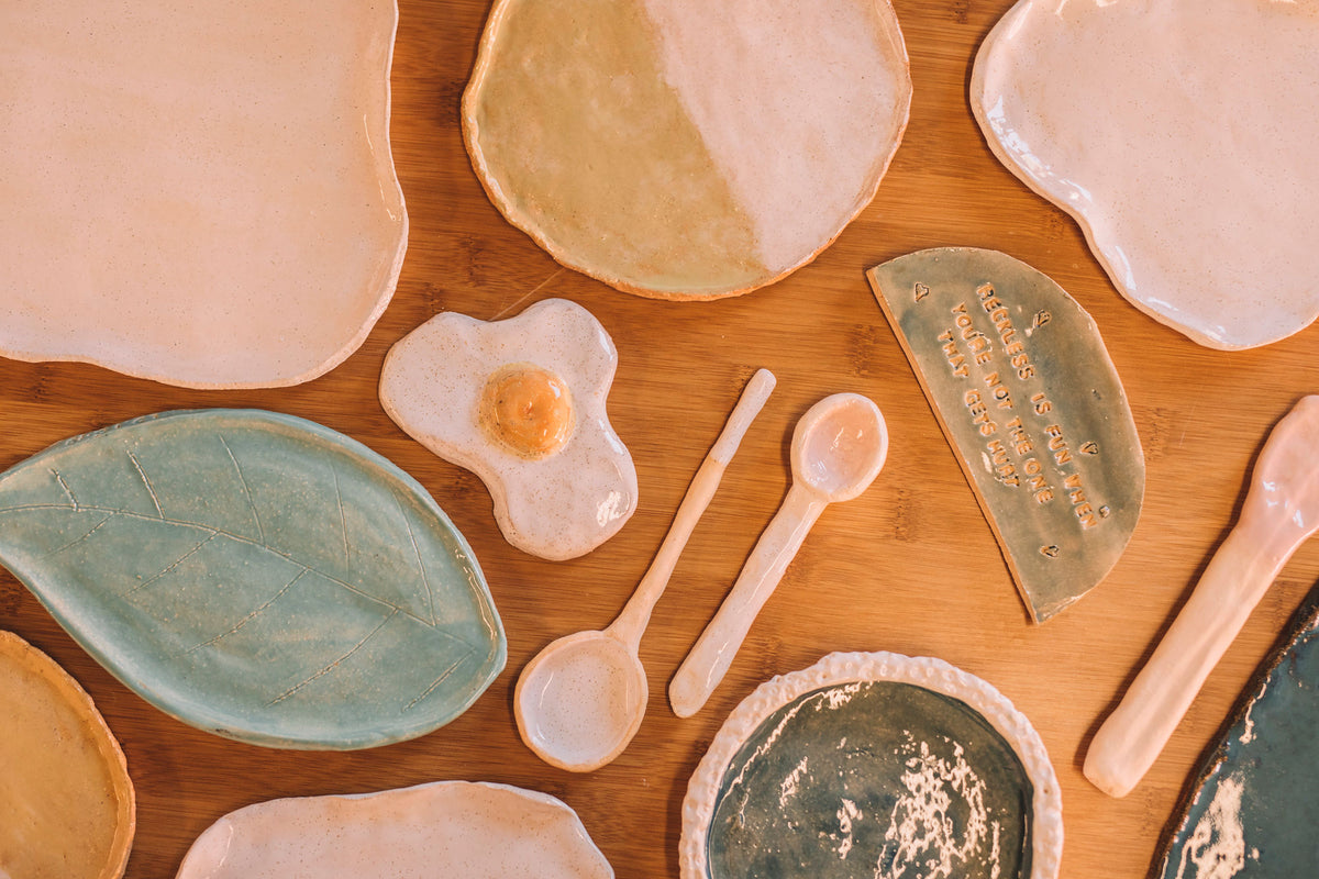 Finished glazed and fired pottery pieces from glazing class, Nambour