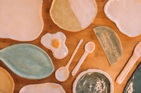 Finished glazed and fired pottery pieces from glazing class, Nambour