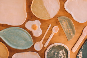 Finished glazed and fired pottery pieces from glazing class, Nambour