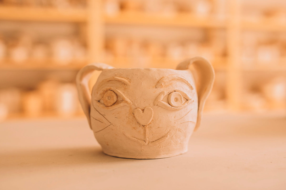 Bisqued pottery piece made by a child in kids class, Nambour