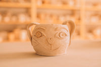 Bisqued pottery piece made by a child in kids class, Nambour