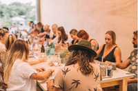 Large group of happy people making pottery together at a table, Nambour