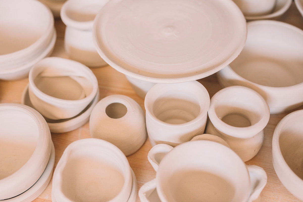 Bisqued pottery pieces made in beginner wheel throwing course, Nambour