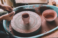 Throwing a cup on the pottery wheel, beginner course, Nambour
